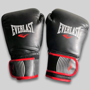 Everlast Core Training Sparring Boxing Gloves 16 oz Red Black pair showing black synthetic leather construction, red trim, Everlast branding, dual-layer padded striking surface, ergonomic wrist-wrap hook-and-loop closure and secured thumb design for adult boxing training, heavy bag work and mitt training.
